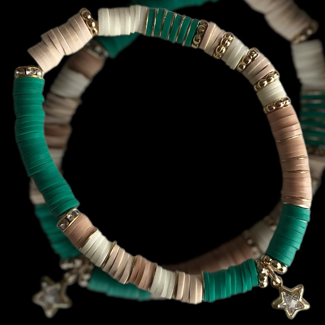 Handmade green beaded bracelet with gold star charm
Celestial Jade bracelet in teal and jade tones
Polymer clay bracelet with star detail in gold