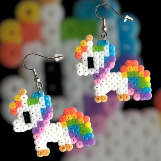 Handmade fuse bead earrings featuring pixel-style baby unicorn design with nickel-free hook findings on kraft card backing